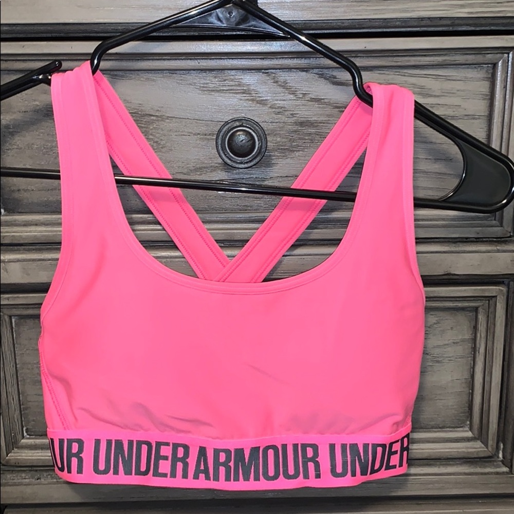 Bright pink Under Armour sports bra